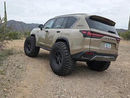 Larger tires on the 700h Overtrail. It was not easy. Lots of trimming. But success. Amazing ground clearance. Gonna take her out Saturday!
